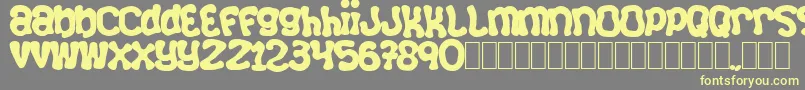 Squizzlie Font – Yellow Fonts on Gray Background