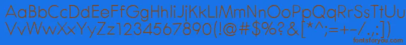 フォントCenturaRound – 茶色の文字が青い背景にあります。