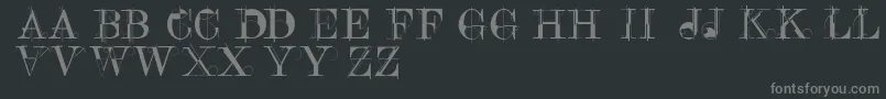 フォントConstrucaps – 黒い背景に灰色の文字