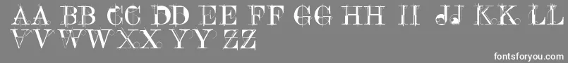 フォントConstrucaps – 灰色の背景に白い文字