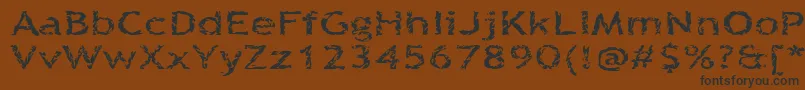 Quinquefoliolate-fontti – mustat fontit ruskealla taustalla