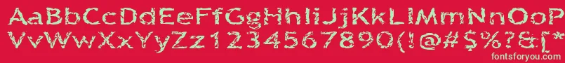 フォントQuinquefoliolate – 赤い背景に緑の文字