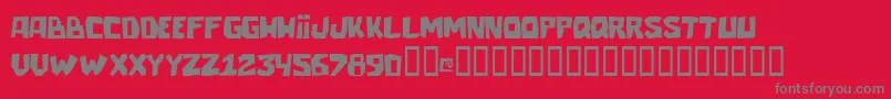 Talacha-Schriftart – Graue Schriften auf rotem Hintergrund