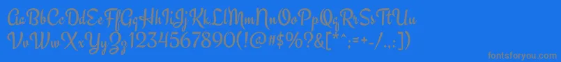 EngagementRegular-fontti – harmaat kirjasimet sinisellä taustalla