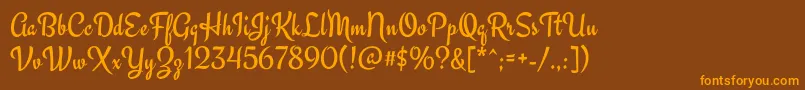 EngagementRegular Font – Orange Fonts on Brown Background