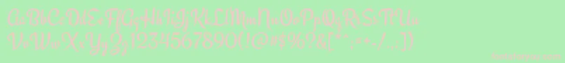 EngagementRegular-fontti – vaaleanpunaiset fontit vihreällä taustalla