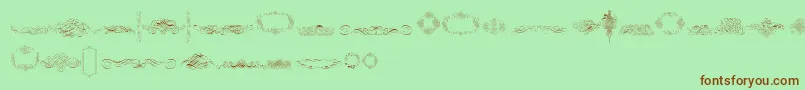 Czcionka CalligraphiaLatinaFree – brązowe czcionki na zielonym tle