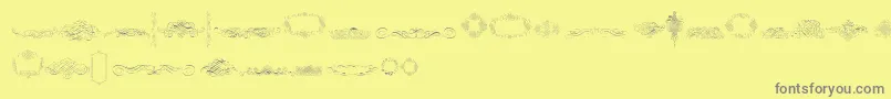 Czcionka CalligraphiaLatinaFree – szare czcionki na żółtym tle