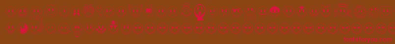 Jlssmilessampler-Schriftart – Rote Schriften auf braunem Hintergrund