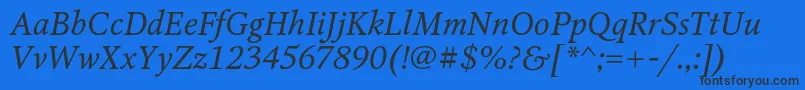 OctavaItalic Font – Black Fonts on Blue Background