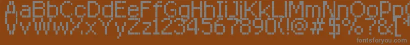 フォントRittswoodredstarRegular8 – 茶色の背景に灰色の文字