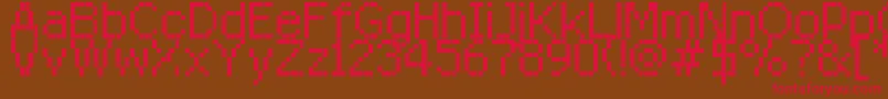 フォントRittswoodredstarRegular8 – 赤い文字が茶色の背景にあります。