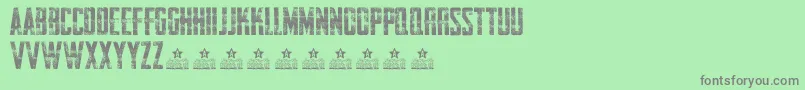 AwakenningSteelPersonalUse-fontti – harmaat kirjasimet vihreällä taustalla