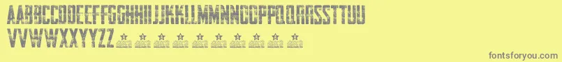 AwakenningSteelPersonalUse-fontti – harmaat kirjasimet keltaisella taustalla