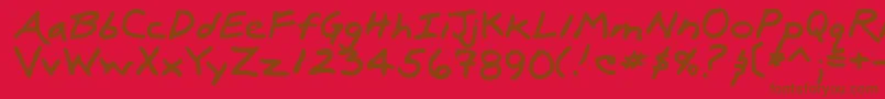 フォントLuxRegular – 赤い背景に茶色の文字