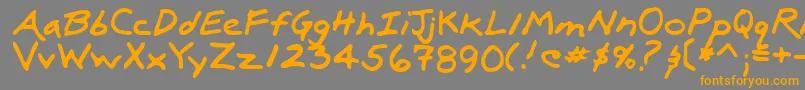 フォントLuxRegular – オレンジの文字は灰色の背景にあります。