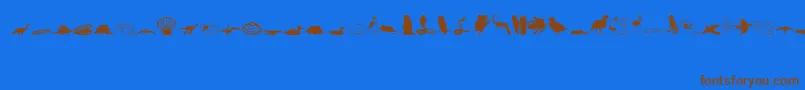 Animals1 Font – Brown Fonts on Blue Background