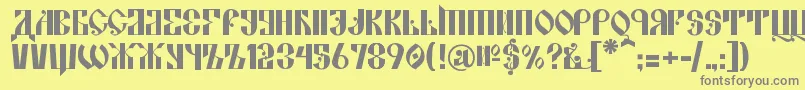 KremlinAlexander-Schriftart – Graue Schriften auf gelbem Hintergrund