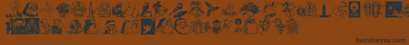 NoelDingbats-Schriftart – Schwarze Schriften auf braunem Hintergrund