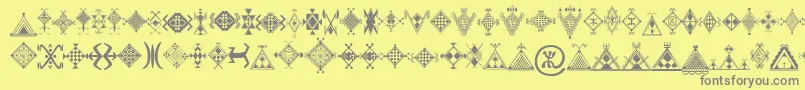 Mzmotifs Font – Gray Fonts on Yellow Background