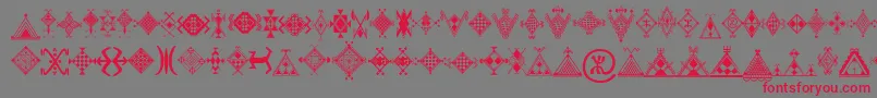 フォントMzmotifs – 赤い文字の灰色の背景