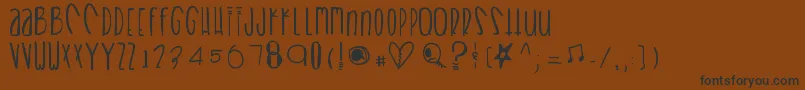 Heartbreaks Font – Black Fonts on Brown Background