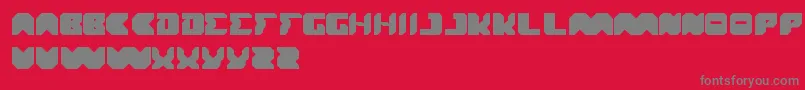 フォントTranslation – 赤い背景に灰色の文字