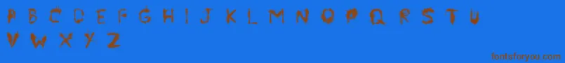 Symbiote-Schriftart – Braune Schriften auf blauem Hintergrund