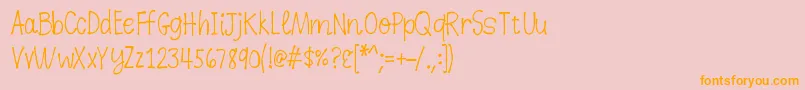 フォントK26dewdropdaisies – オレンジの文字がピンクの背景にあります。