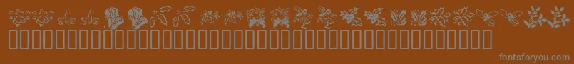 fuente KrLotsOfHolly – Fuentes Grises Sobre Fondo Marrón