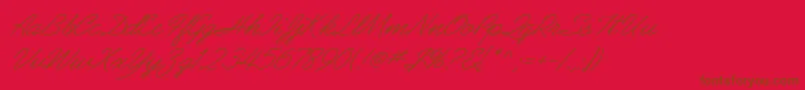 フォントAbrazoScriptSsiItalic – 赤い背景に茶色の文字