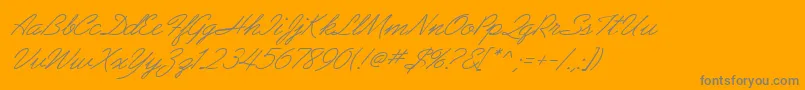 Więcej informacji o czcionce AbrazoScriptSsiItalic Czcionka AbrazoScriptSsiItalic – szare czcionki na pomarańczowym tle