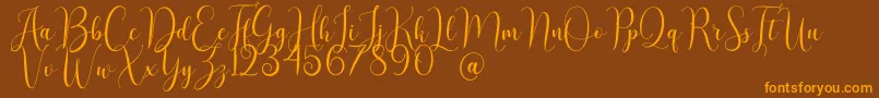 AsyielaDemo Font – Orange Fonts on Brown Background