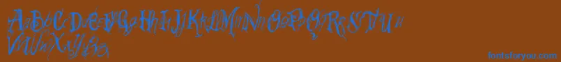 Vtks Summerland-Schriftart – Blaue Schriften auf braunem Hintergrund
