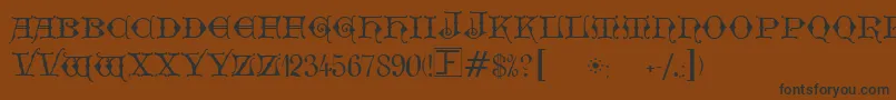 GeschlossenGotikKaps Font – Black Fonts on Brown Background