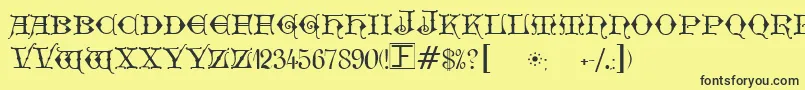 フォントGeschlossenGotikKaps – 黒い文字の黄色い背景