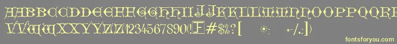 GeschlossenGotikKaps Font – Yellow Fonts on Gray Background