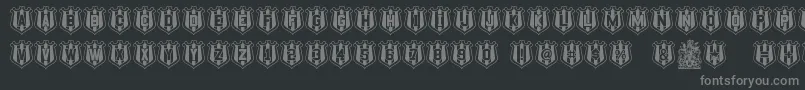 NufcSheild Font – Gray Fonts on Black Background