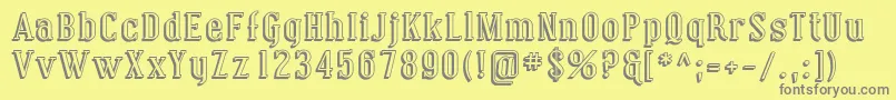 フォントCoving13 – 黄色の背景に灰色の文字