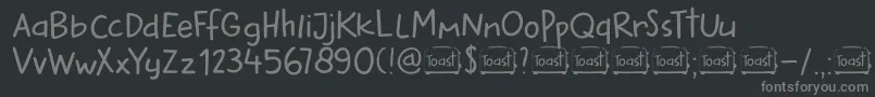 Fonte DkButteredToast – fontes cinzas em um fundo preto