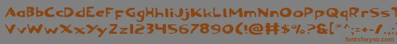 Ozyv2e Font – Brown Fonts on Gray Background