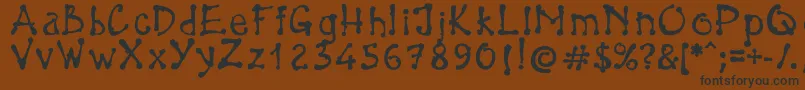 BrokenPen-fontti – mustat fontit ruskealla taustalla