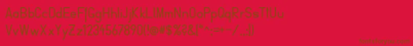 FibelVienna-Schriftart – Braune Schriften auf rotem Hintergrund