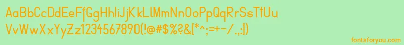FibelVienna-Schriftart – Orangefarbene Schriften auf grünem Hintergrund