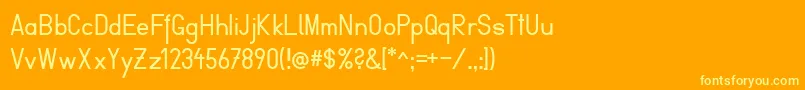 FibelVienna-Schriftart – Gelbe Schriften auf orangefarbenem Hintergrund