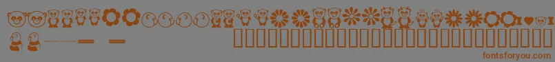 フォントPandamoniumBv – 茶色の文字が灰色の背景にあります。