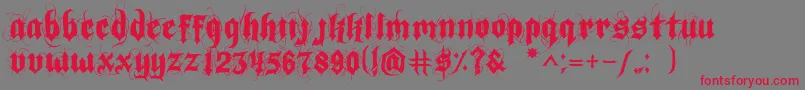 IndoctrineJlloyd Font – Red Fonts on Gray Background