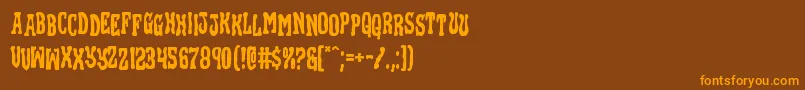 Blackgunkstag Font – Orange Fonts on Brown Background