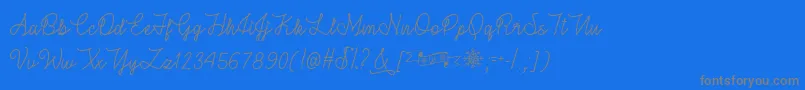 WinterInJanuaryOtf-Schriftart – Graue Schriften auf blauem Hintergrund