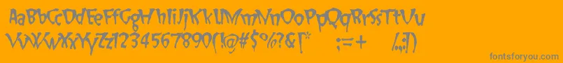 SlapHappy-fontti – harmaat kirjasimet oranssilla taustalla